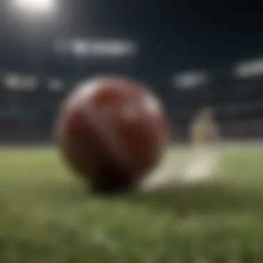 Close-up of cricket ball hitting the wickets