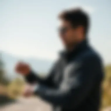 An individual using a fitness tracker during outdoor exercise