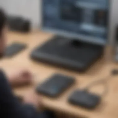 A tech enthusiast troubleshooting the ONN TV Box with a laptop in hand