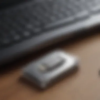 Low profile USB drive connected to a laptop in a professional setting