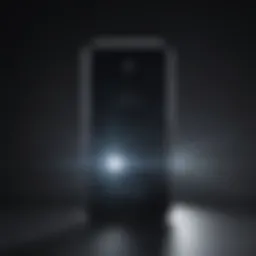 Close-up of smartphone flashlight illuminating a dark space